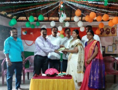 Handing over of cheque towards a teacher’s salary to DK ZP HP School Bengre